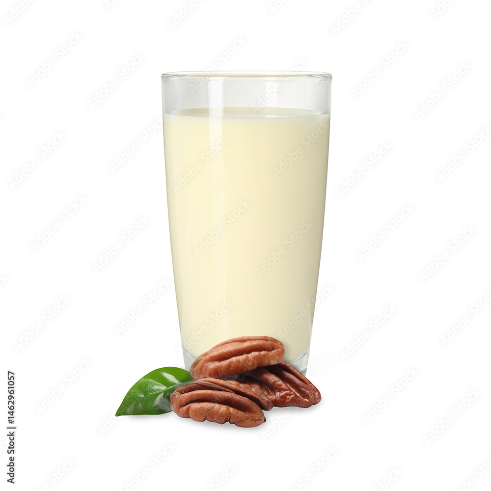 Nut milk in glass and pecans isolated on white Nut milk in glass and pecans isolated on white