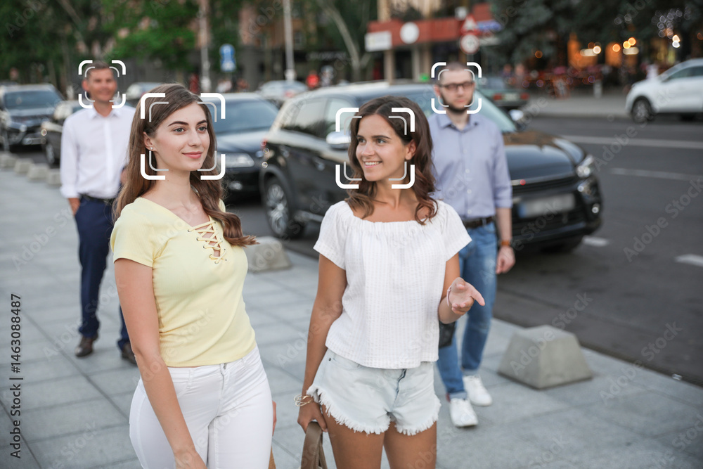 Facial recognition system identifying people on city street, selective focus Facial recognition system identifying people on city street, selective focus