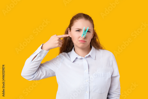 Ill young woman pointing at...