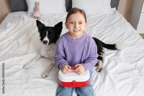 Cute little girl with first...