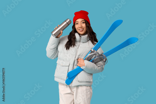 Young Asian woman in winter...