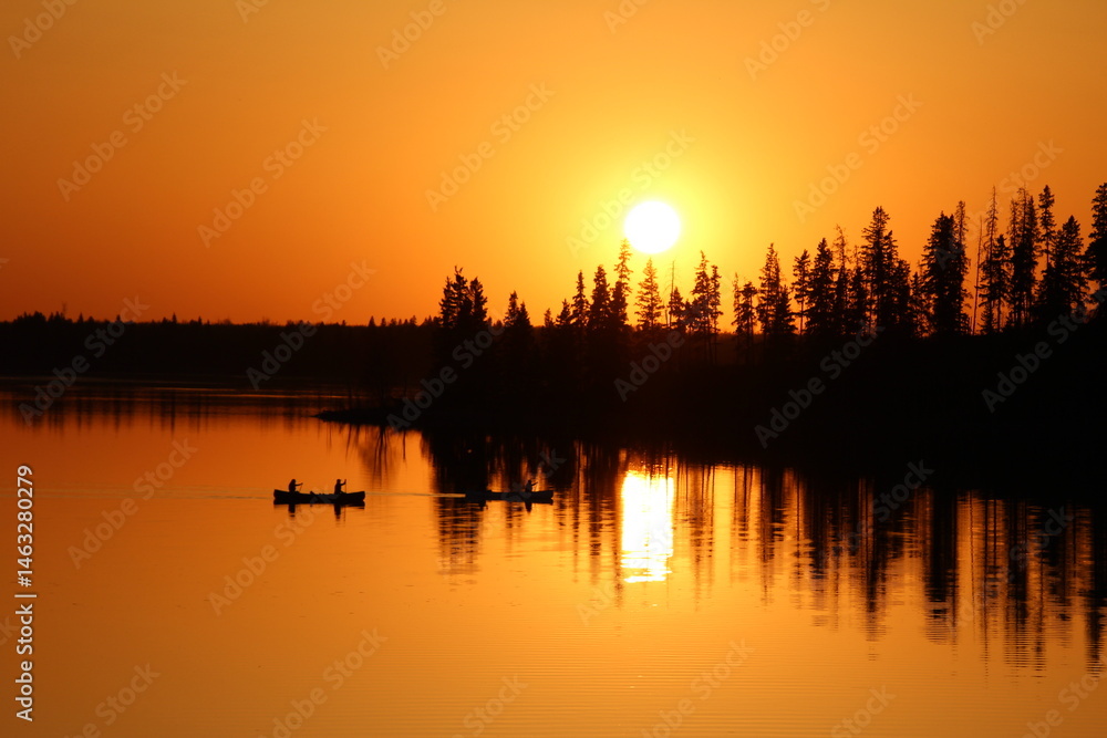 Naklejka premium Boats On The Sunset