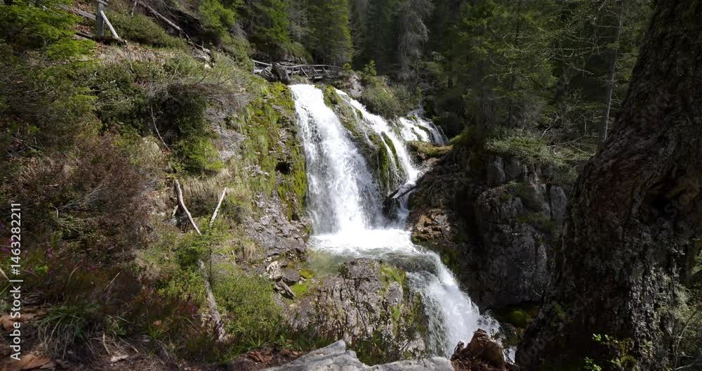 Dancing waterfalls among the Dolomite peaks. Dancing waterfalls among the Dolomite peaks.
