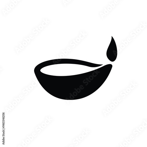 Elegant black and white diya oil lamp symbol of diwali and festive celebration