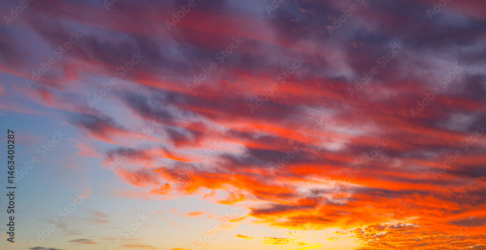Sky at sunrise. Sunset background. Sunrise through clouds on sky. Twilight sky with sunrise colors. Peaceful dawn with soft light. Dramatic dusk sunrise with clouds. Sunshine in clear sky.