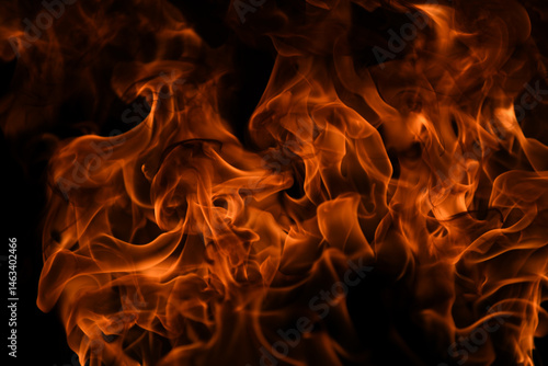 Fire blaze flames on black background. Fire burn flame isolated, abstract texture. Flaming explosion with burning effect. Fire wallpaper, abstract art pattern.
