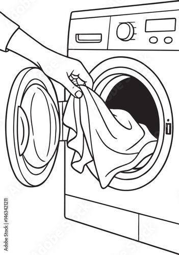 person takes clothes out of the washing machine