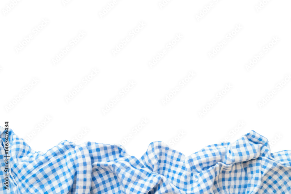 A crumpled blue and white checkered fabric against a stark black A crumpled blue and white checkered fabric against a stark black