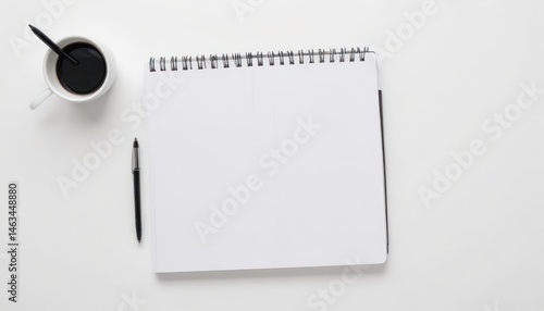 Wallpaper Mural Blank Spiral Notebook, Coffee Cup, and Pen on White Desk. Minimalist Workspace Setup for Writing, Planning, or Note-Taking. Torontodigital.ca