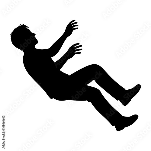 Silhouette of man falling backward in midair