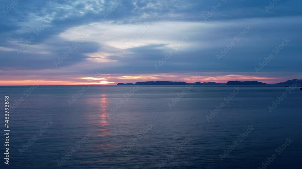 Golden Light Sunset Reflecting on Calm Sea in Northern Norway Golden Light Sunset Reflecting on Calm Sea in Northern Norway