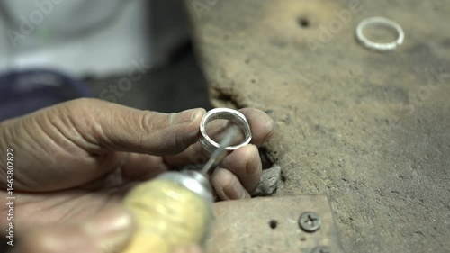 Jeweler at work in jewelry. Desktop for craft jewelry making with professional tools. Close up view of tools. Thailand.	