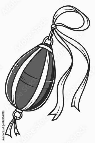Vintage Boxing Speed Bag Hanging From a Beam With Decorative Ribbon in a Gym Setting