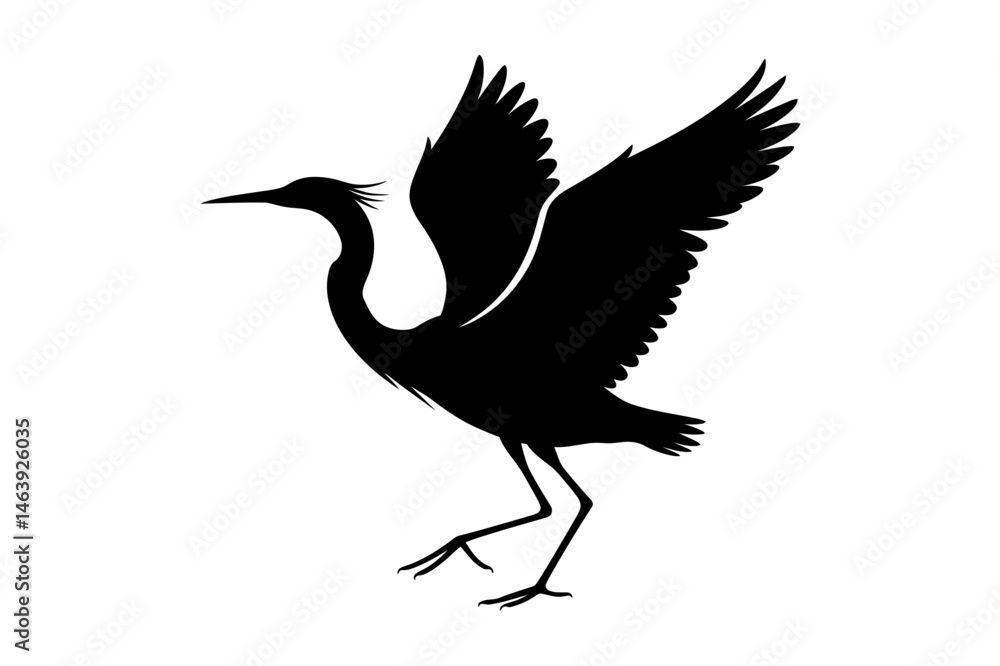 Fototapeta premium Silhouette of heron bird flying with wings spread