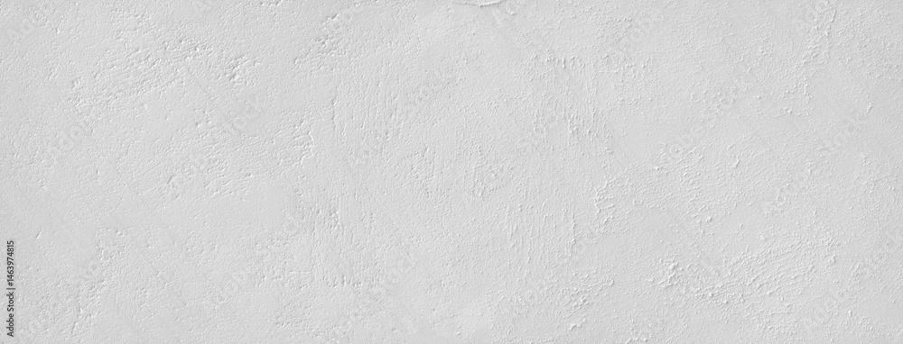 Naklejka premium Large white grunge textured concrete wall background. The backdrop is a rough cement floor
