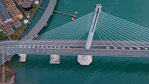 Birds eye aerial view of the Cebu Cordova Link Expressway where it meets downtown Cebu City, Philippines.