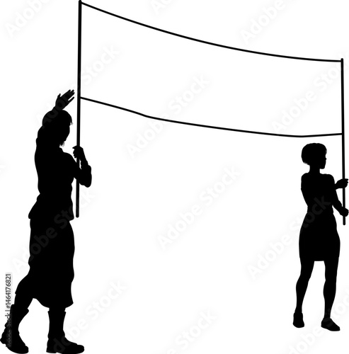 Two protestors or demonstrators at a demonstration march, picket line or strike protest rally in silhouette. Holding up a banner sign.