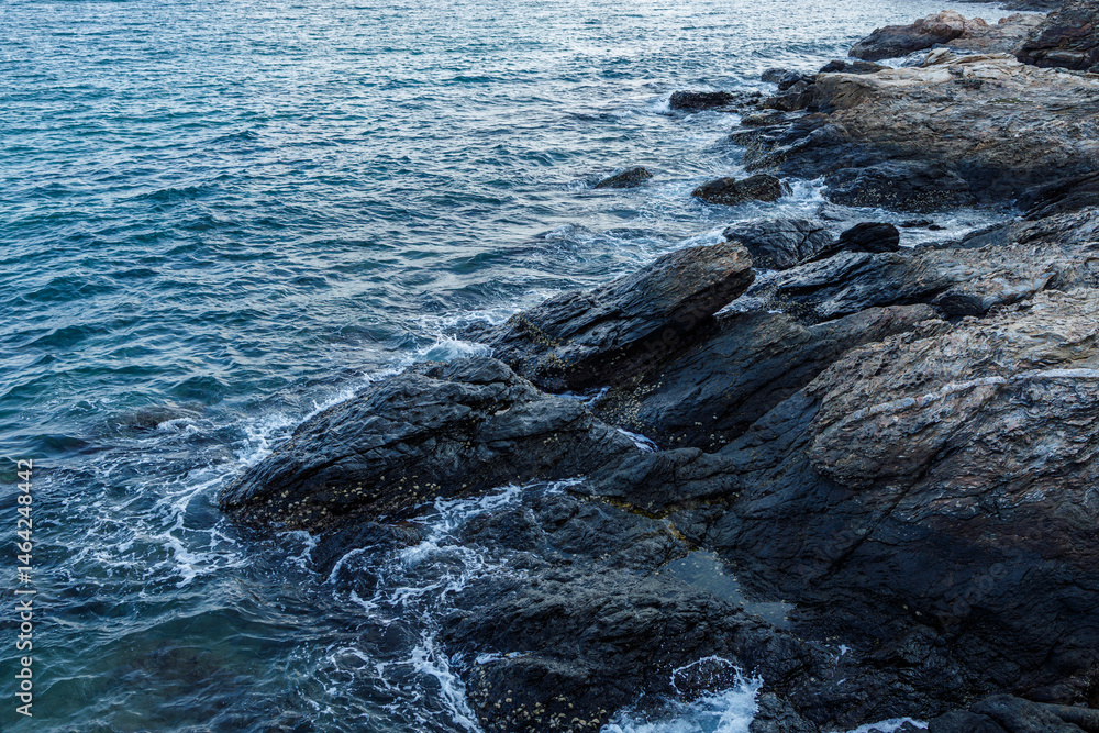 Fototapeta premium Ocean Reef, Rocks by the sea, a beautiful of ancient rock stone of seashore