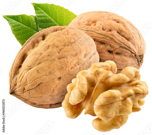 Walnut isolated png. Unpeeled walnut with a half on transparent background. Perfect retouched walnuts with kernel and leaf no background. Nuts with leaves composition. Full depth of field.