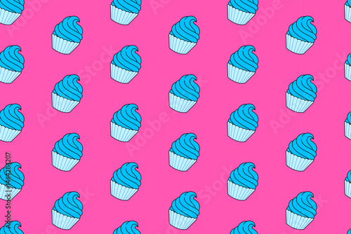 cupcakes with blue frosted and swirl doodle seamless pattern on a pink background. The cupcakes are blue frosted and have a frosting swirl pattern background for packaging and merchandise