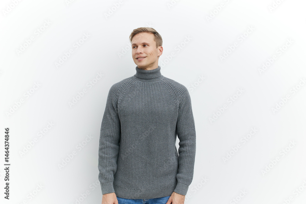 Fototapeta premium smiling man in gray knitted turtleneck sweater standing look aside isolated white background casual autumn winter clothing, mental health concept
