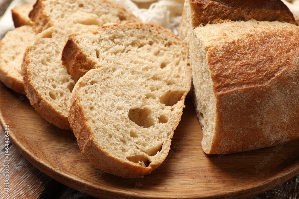 Pieces of fresh bread on table, closeup Pieces of fresh bread on table, closeup