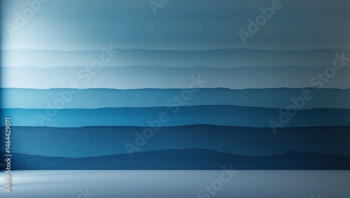 Misty blue mountain landscape at sunrise with clouds and water reflection