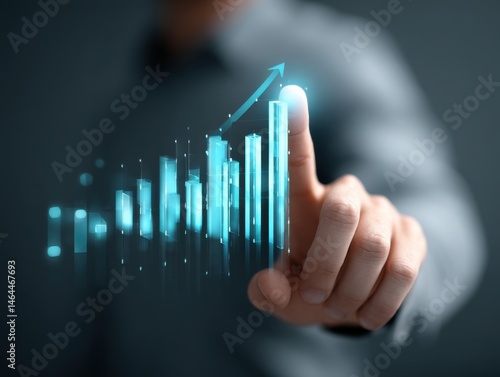 Businessman touching a blue-colored virtual digital bar pointing a finger to the maximum or maximum scale value in the air for a growth concept on a grey background.