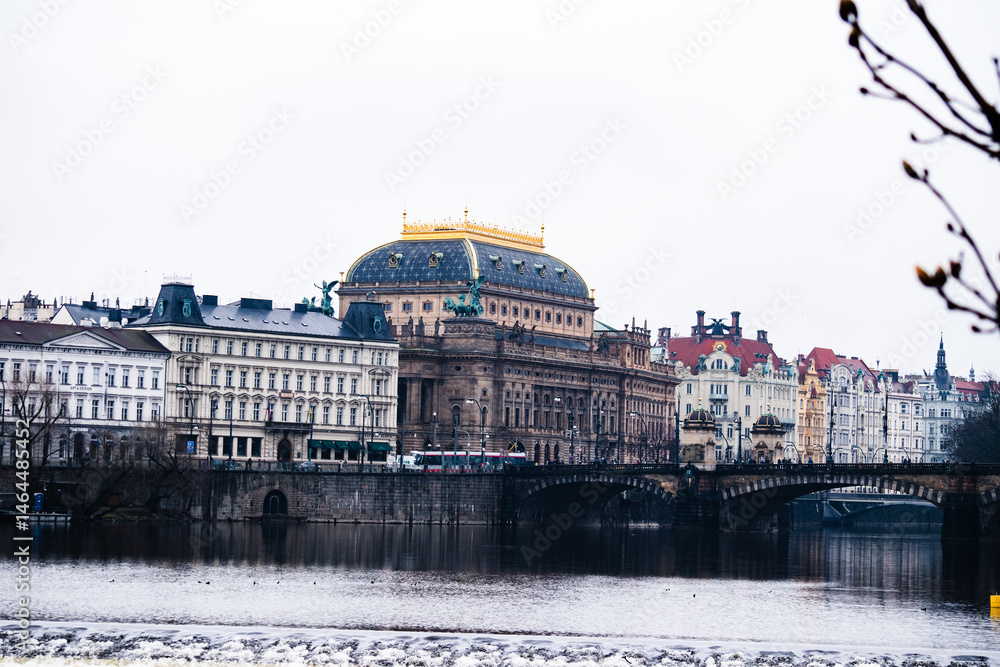 Naklejka premium Cityscape view of the city of Prague in the Czech Republic as seen from across the river Vltava.