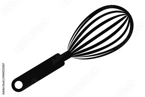The sleek, black whisk is isolated, standing out against a crisp, white background