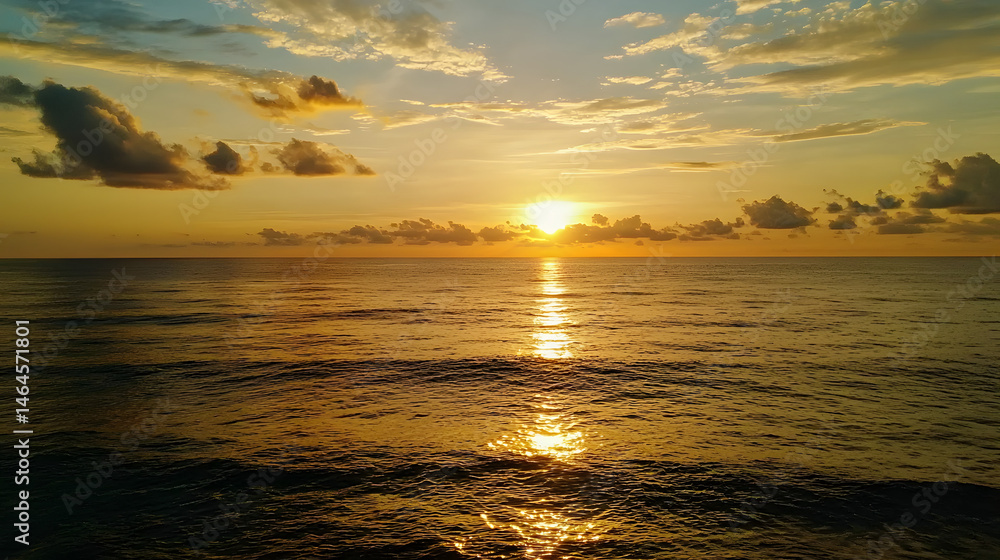 Fototapeta premium A Breathtaking Golden Sunrise Over A Vast Ocean with S C067e97a A1a9 4605 Bf91 95eeac60e43b 0