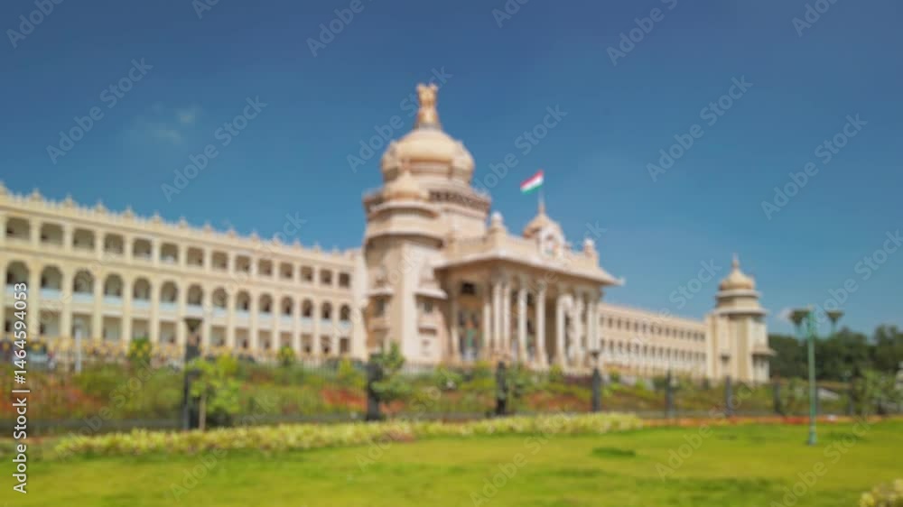 Bokeh view of Government office building (Suvarna Vidhana Soudha) in Bangalore, India. Blurred background footage. Bokeh view of Government office building (Suvarna Vidhana Soudha) in Bangalore, India. Blurred background footage.