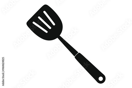 A sleek black spatula with a slotted head is perfect for kitchen tasks