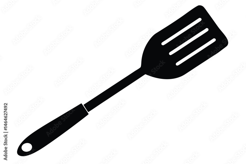 A sleek black spatula with ventilation slots and a hanging hole on a white backdrop A sleek black spatula with ventilation slots and a hanging hole on a white backdrop