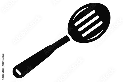 A black cooking slotted spoon with a long handle rests against a white background