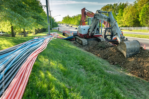 Картината върху платно excavator and drilling equipment for laying broadband internet cables underground