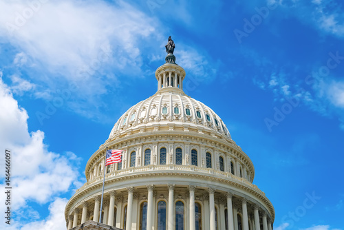 View of the dome of the U.S. Capitol against a blue sky in Washington, D.C.