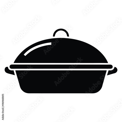 The black casserole dish with lid suggests home cooking and family meals