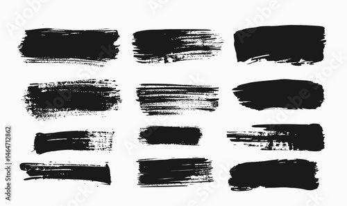 Set of twelve black ink brush strokes with rough textured edges and varied paint patterns isolated on white background for grunge design elements and artistic backgrounds