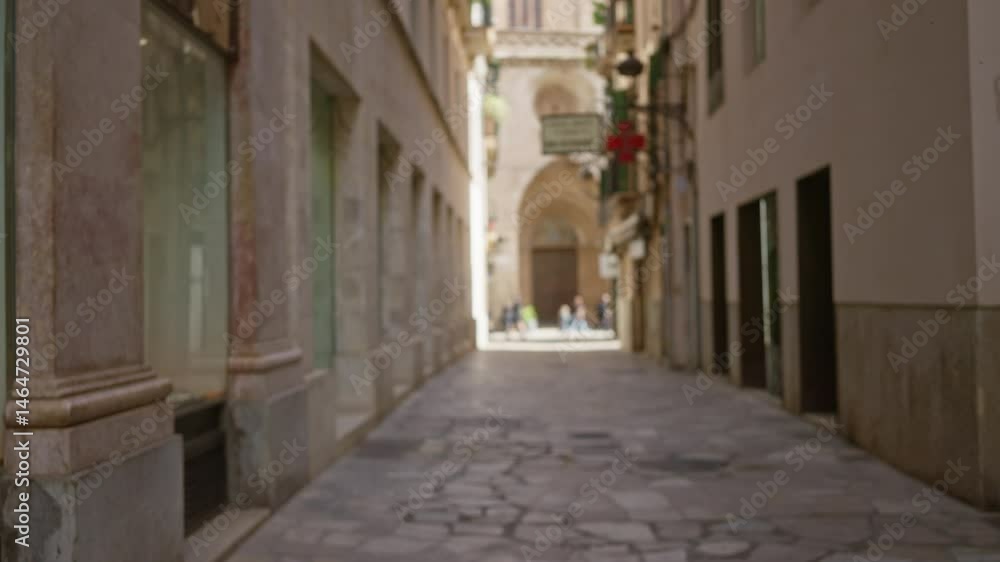 Old town street with blurred pedestrians and historic mediterranean architecture under sunlight, showcasing narrow alleyways and distant figures out of focus. Old town street with blurred pedestrians and historic mediterranean architecture under sunlight, showcasing narrow alleyways and distant figures out of focus.