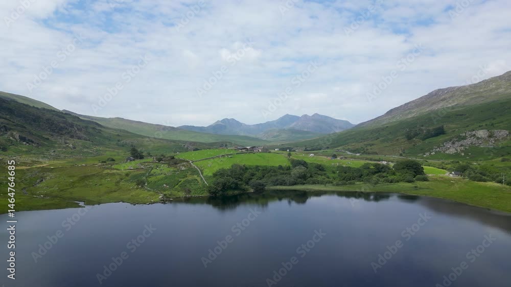 Lakeside campsite overlooking Mount Snowdon, Eryri North Wales. Lakeside campsite overlooking Mount Snowdon, Eryri North Wales.