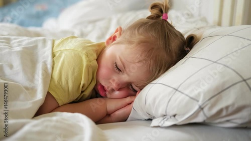 Wallpaper Mural Peaceful adorable baby sleeping on a bed at home. Slumbering little child. Two years old girl sleeps peaceful at domestic room interior background. Serene dream. Cute face close up. Deep kid slumber Torontodigital.ca