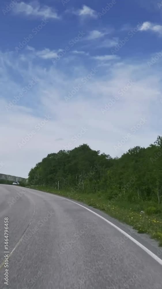 Vertical view of Norway road from car Vertical view of Norway road from car