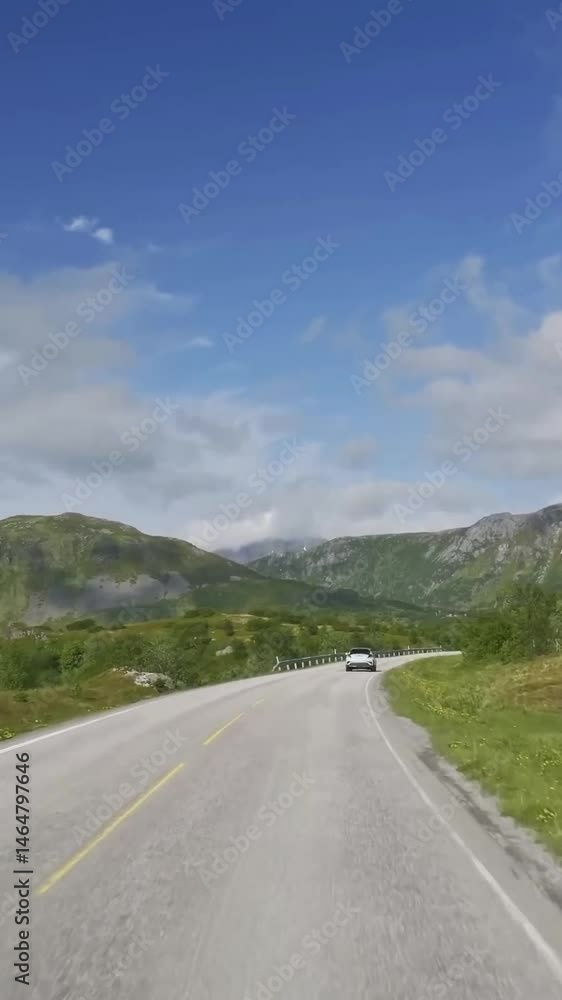 Vertical view of Norway road from car Vertical view of Norway road from car