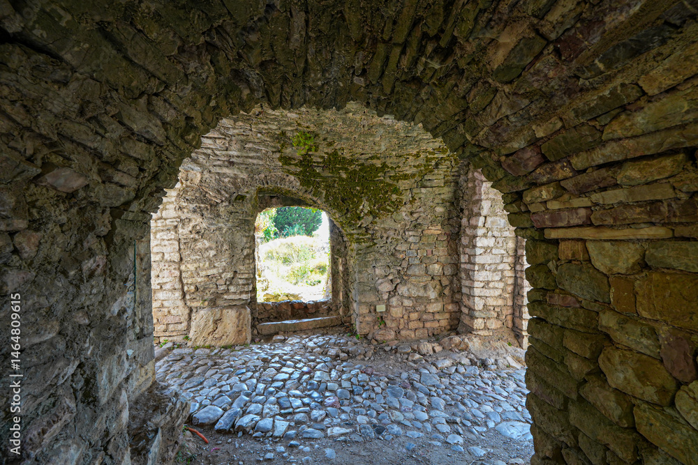 Obraz premium Vaulted passageway in Stari grad Bar (Old Town of Bar), an ancient walled city overlooking the Adriatic Sea in Montenegro