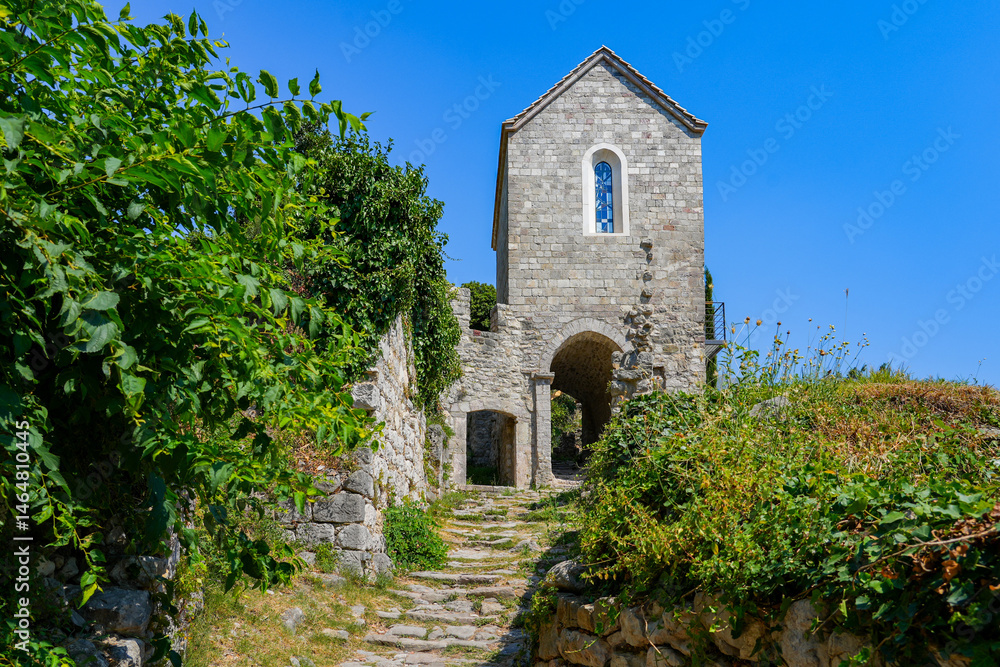 Naklejka premium St Catherine’s Church in Stari grad Bar (Old Town of Bar), the ruins of an ancient walled city at the foot of Mount Rumija in Montenegro