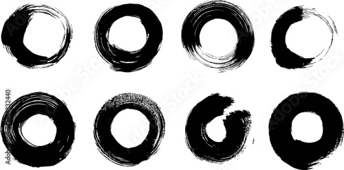 Set of eight black enso circles with brush strokes. Vector illustration