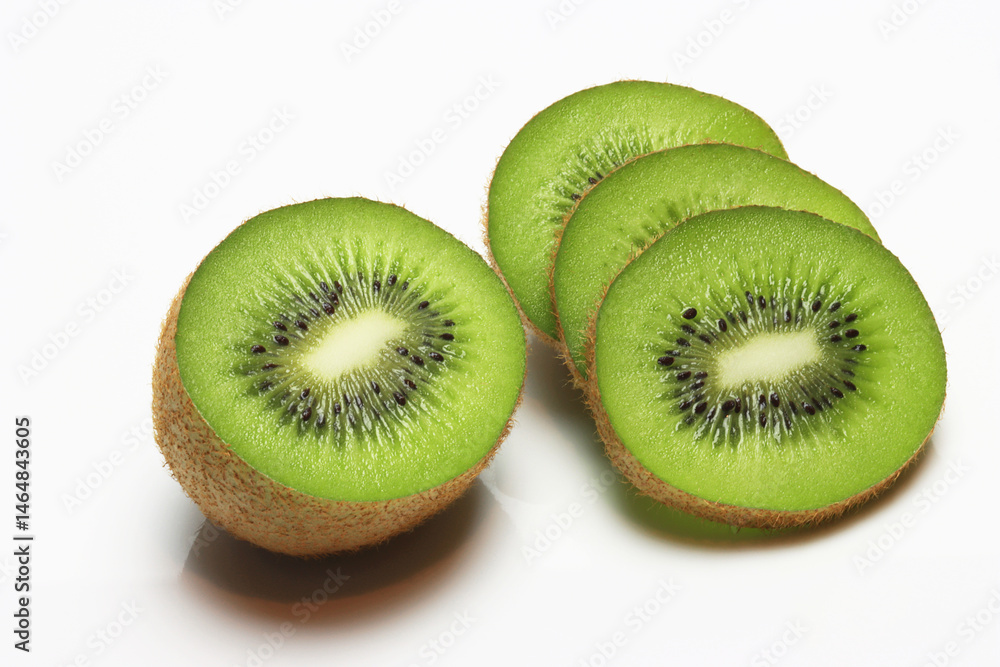 Fototapeta premium Fresh Kiwi fruit , sliced , halved on white background
