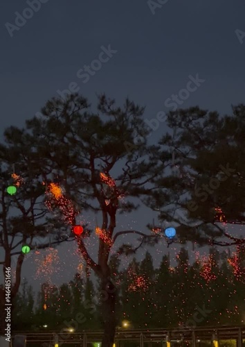 A Buddhist religious celebration involving a falling fireworks.
