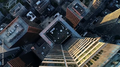 Aerial view of modern city skyscrapers. Rooftop patios and urban density